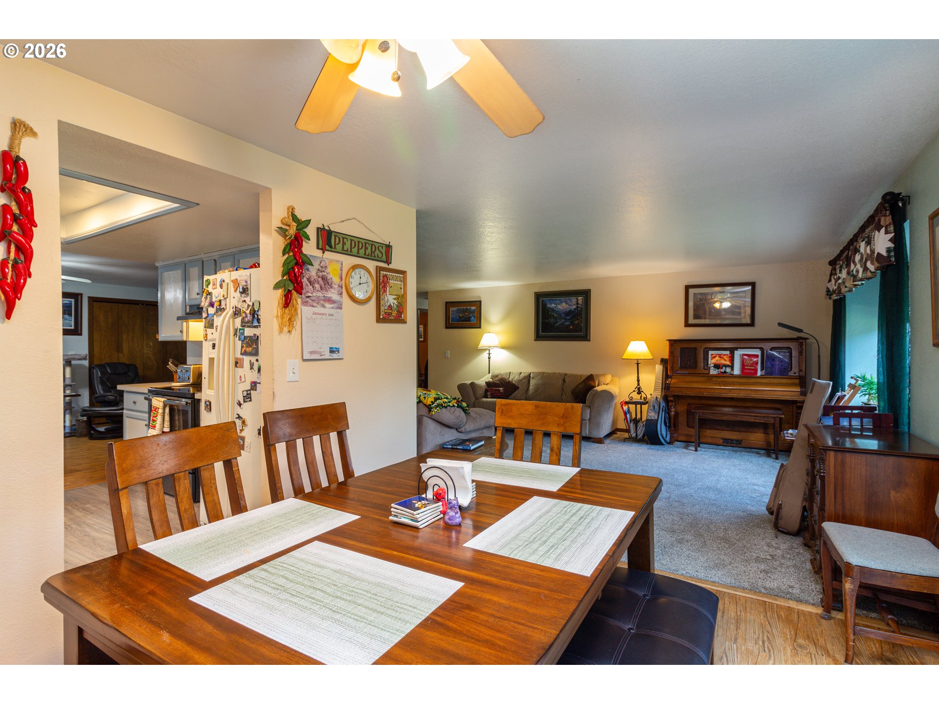 305 Southeast 9th Drive Hermiston, OR 97838 - Photo 15 of 28 a living room with furniture and a flat screen tv