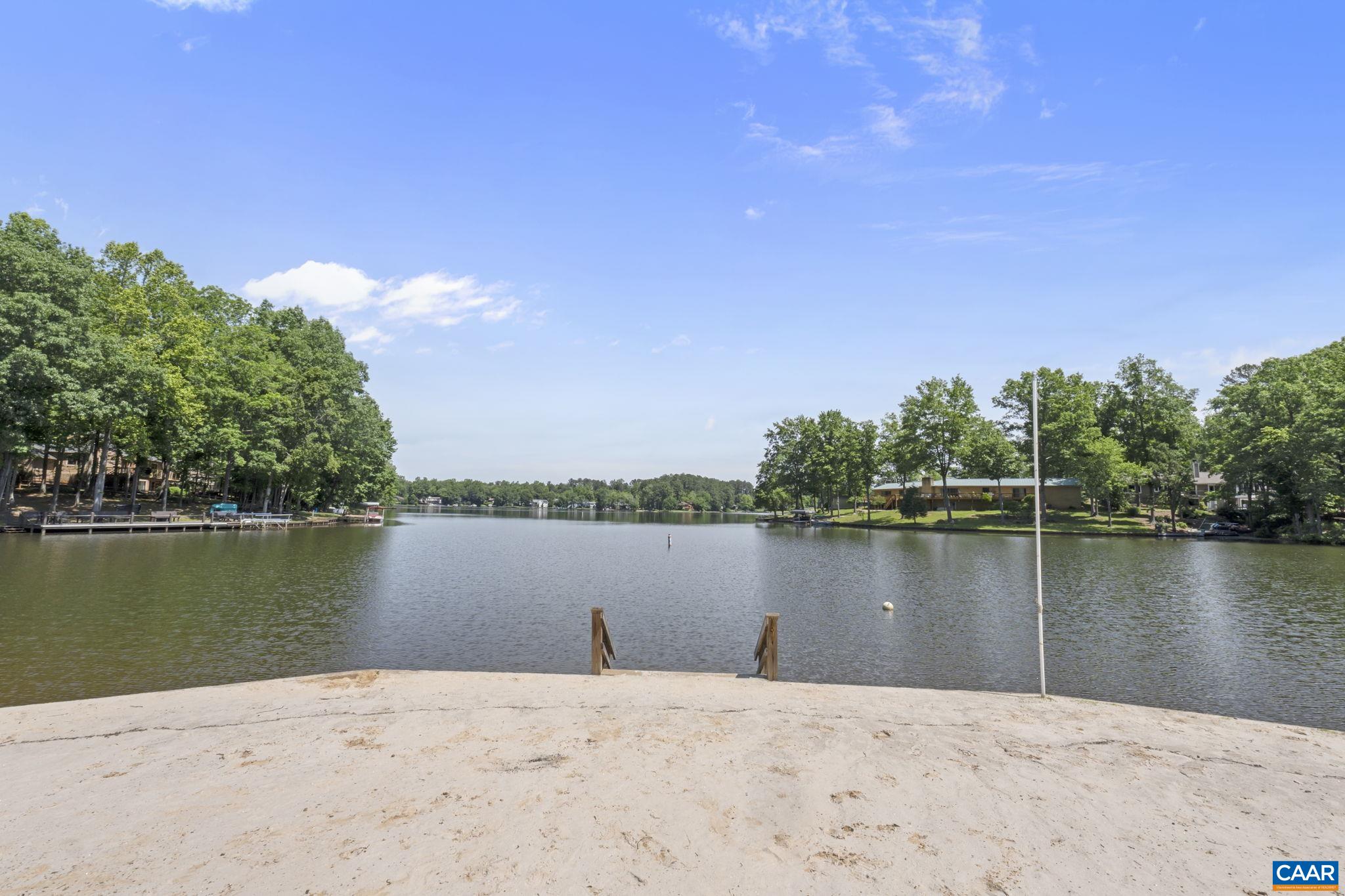 2 Whippoorwill Lane Palmyra, VA 22963 - Photo 33 of 36 a view of a lake next to a lake with a city view