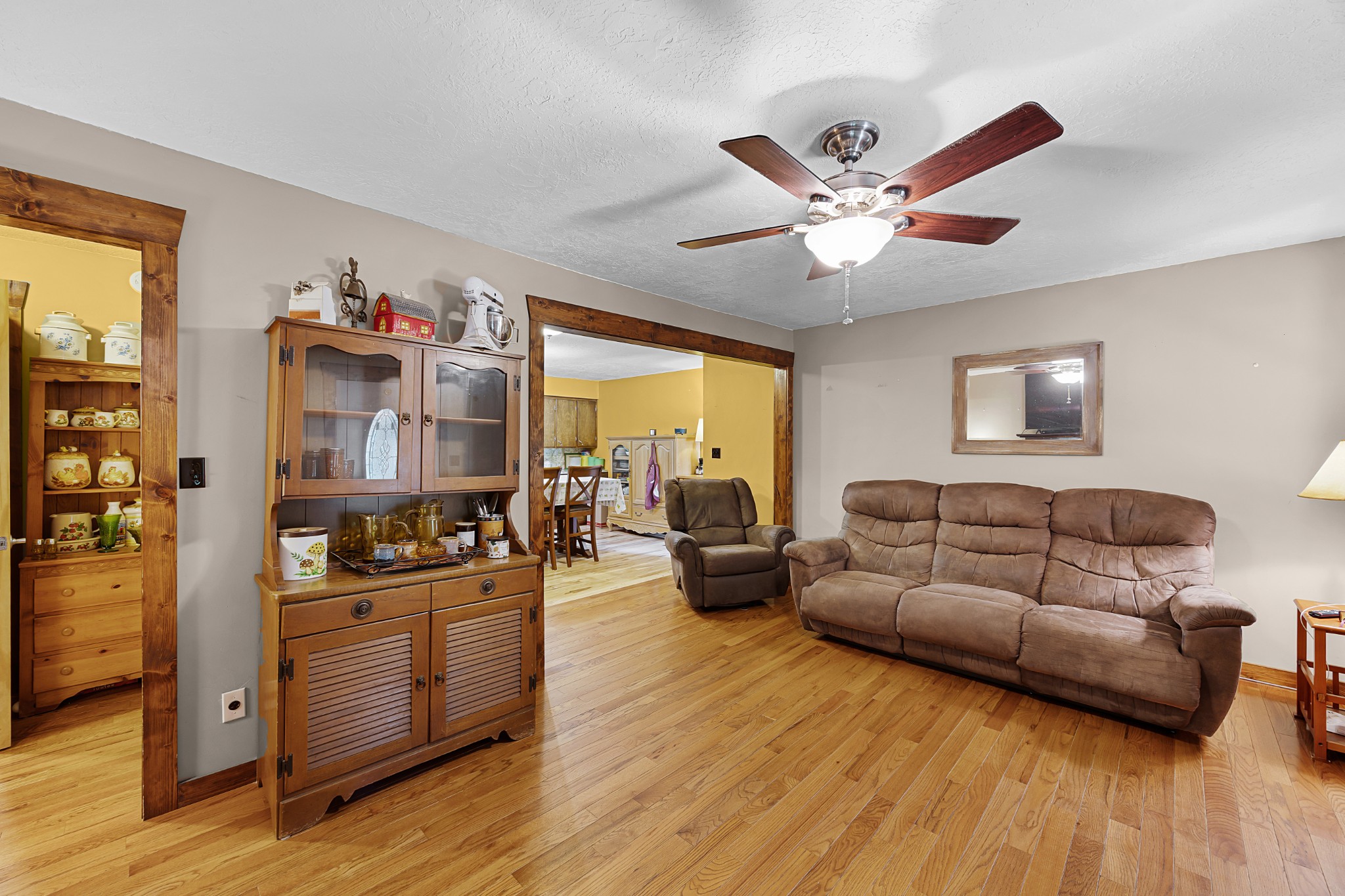 301 Killebrew Road Springville, TN 38256 - Photo 4 of 11 a living room with furniture and a wooden floor