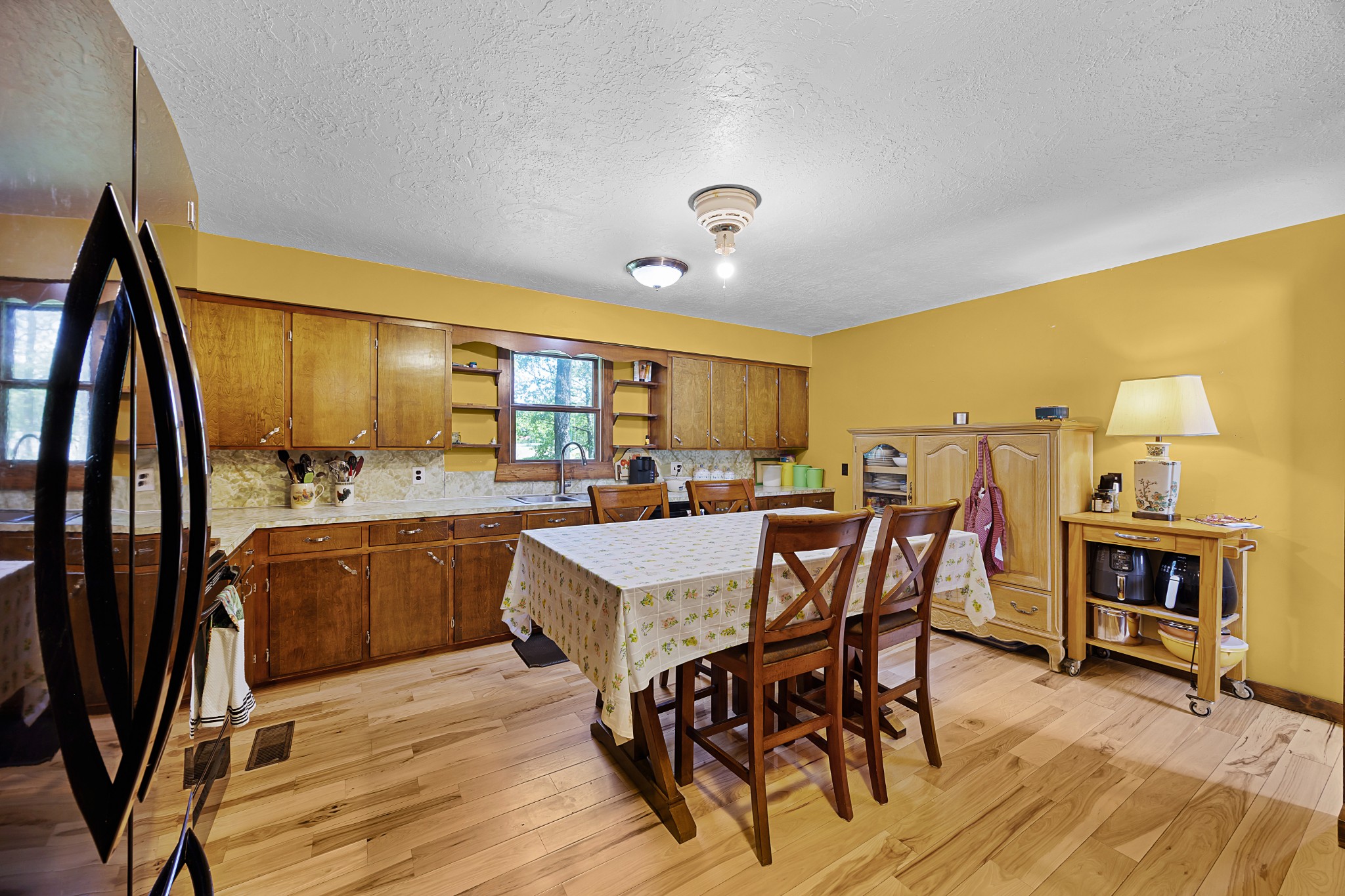 301 Killebrew Road Springville, TN 38256 - Photo 5 of 11 a large kitchen with a table and chairs