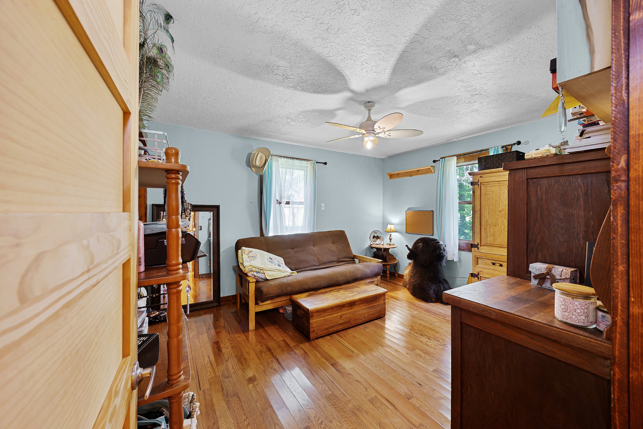 301 Killebrew Road Springville, TN 38256 - Photo 9 of 11 a living room with furniture and a flat screen tv