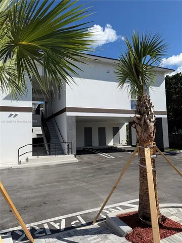 a view of house with yard