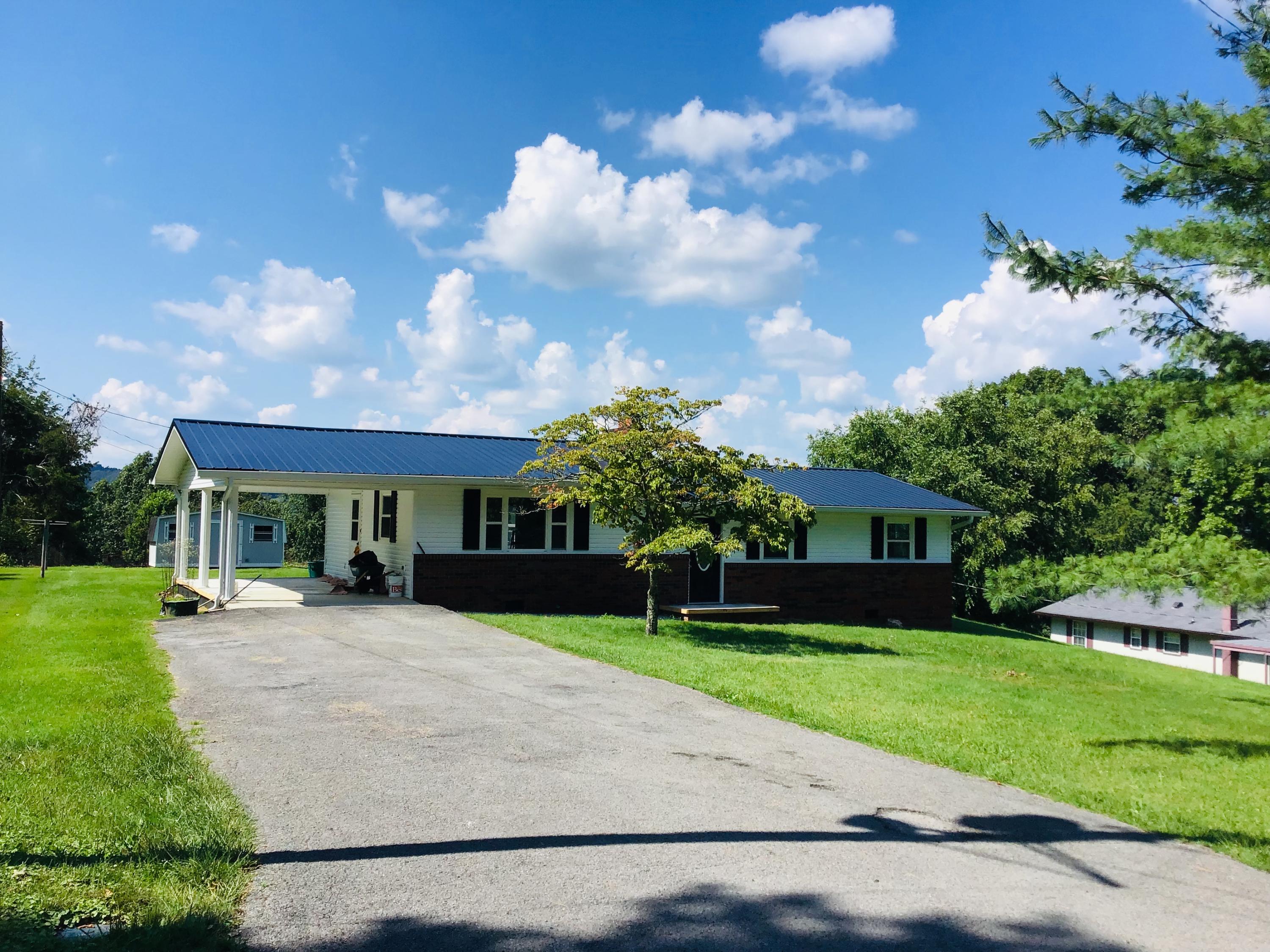 404 Russell Road South New Tazewell, TN 37825 - Photo 1 of 20 82B876AC-8625-4AB9-BA0D-265C5BCB9ACE
