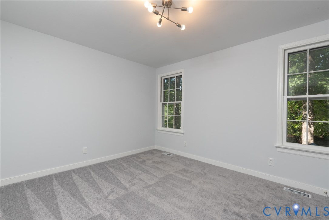 14011 Turtle Hill Road Midlothian, VA 23112 - Photo 13 of 34 an empty room with windows