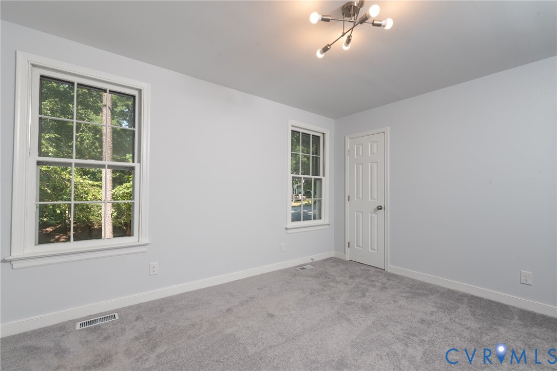 14011 Turtle Hill Road Midlothian, VA 23112 - Photo 14 of 34 an empty room with a window
