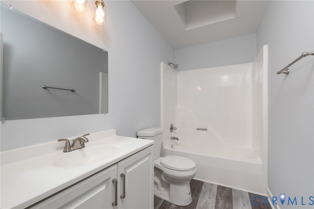 14011 Turtle Hill Road Midlothian, VA 23112 - Photo 18 of 34 a bathroom with a sink a toilet and shower