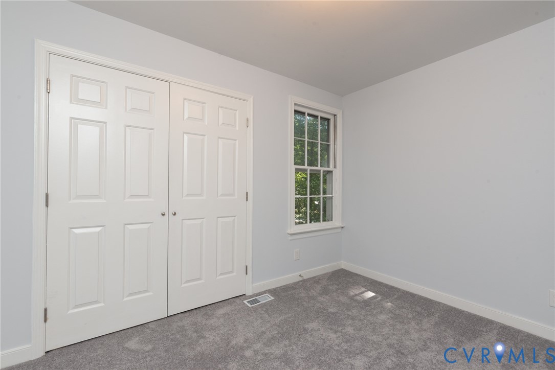 14011 Turtle Hill Road Midlothian, VA 23112 - Photo 20 of 34 an empty room with windows