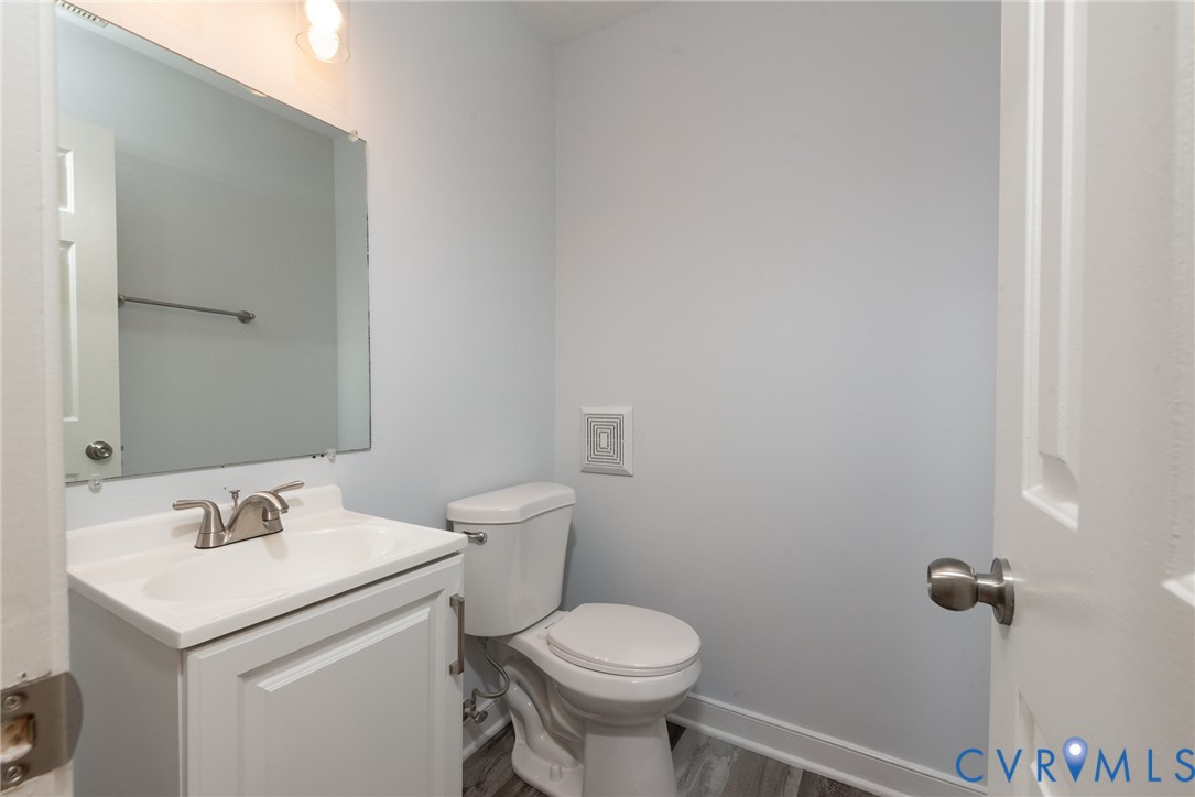14011 Turtle Hill Road Midlothian, VA 23112 - Photo 30 of 34 a bathroom with a sink toilet and a mirror