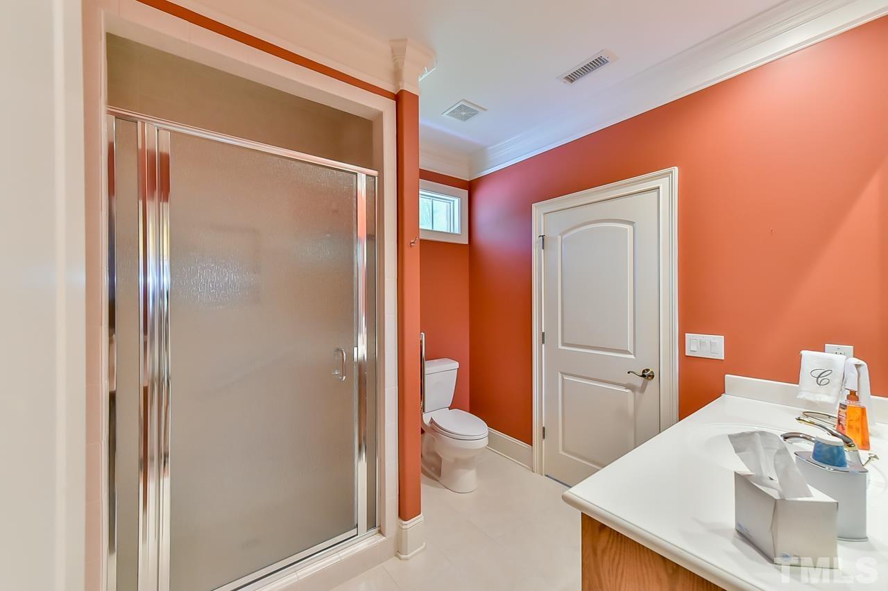 2734 River Forks Road Sanford, NC 27330 - Photo 11 of 30 a bathroom with a sink and a mirror