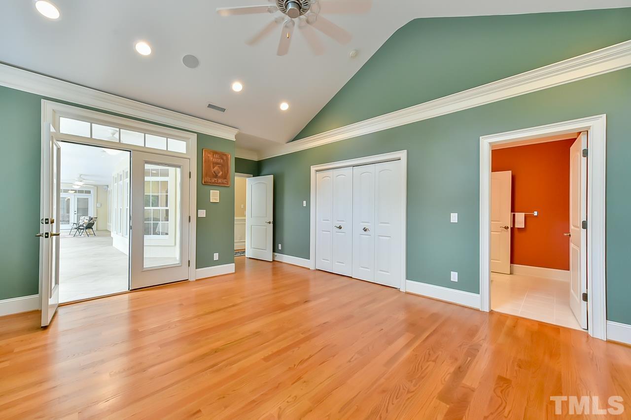 2734 River Forks Road Sanford, NC 27330 - Photo 12 of 30 a view of an empty room with glass door and balcony
