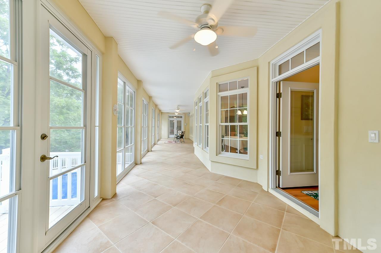 2734 River Forks Road Sanford, NC 27330 - Photo 13 of 30 a view of a hallway with wooden floor and windows