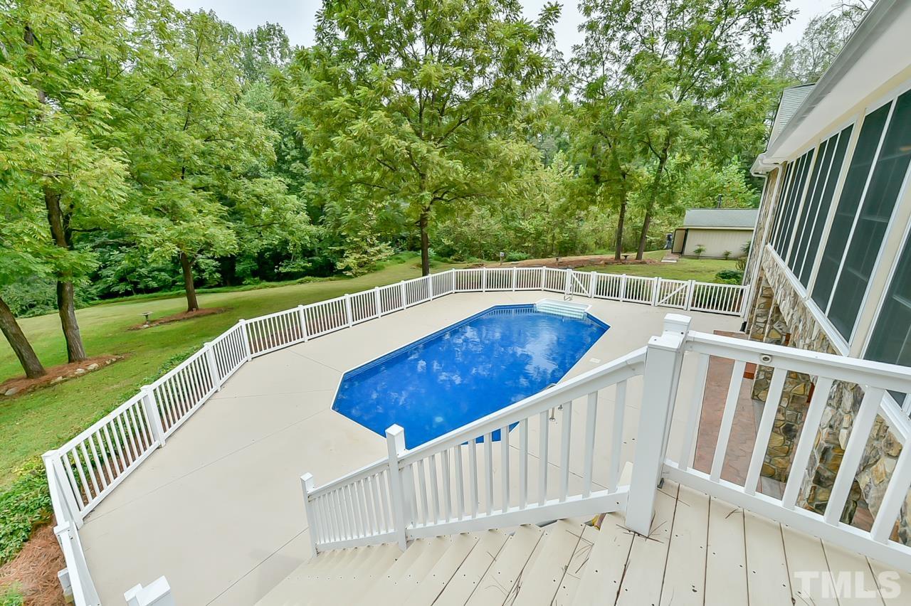 2734 River Forks Road Sanford, NC 27330 - Photo 14 of 30 a view of deck with a large trees and wooden fence