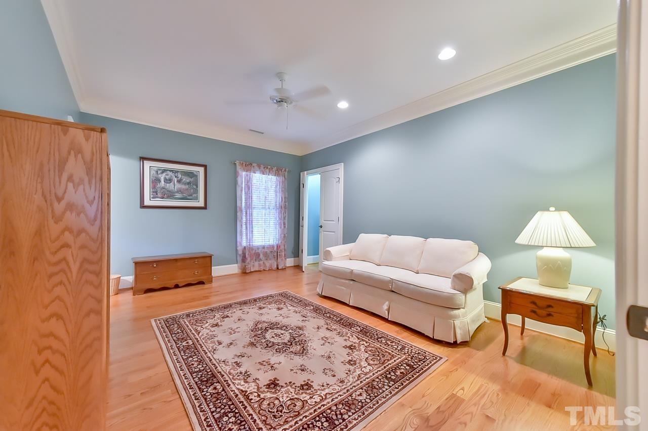 2734 River Forks Road Sanford, NC 27330 - Photo 19 of 30 a living room with furniture and a rug