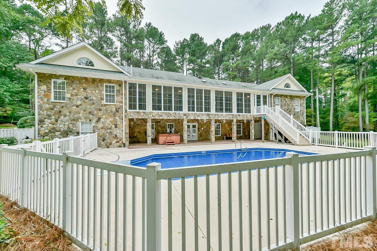 2734 River Forks Road Sanford, NC 27330 - Photo 2 of 30 a front view of a house with a yard