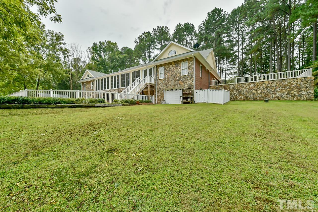 2734 River Forks Road Sanford, NC 27330 - Photo 29 of 30 a view of a house with a yard and sitting area