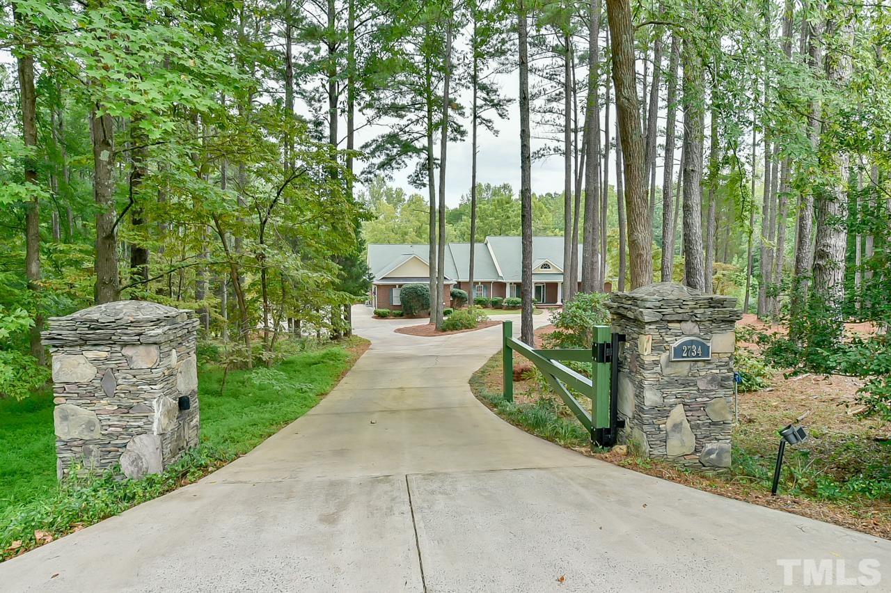 2734 River Forks Road Sanford, NC 27330 - Photo 3 of 30 a park with large trees and plants