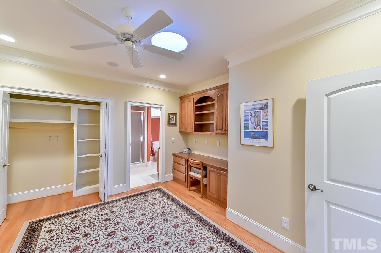 2734 River Forks Road Sanford, NC 27330 - Photo 10 of 30 a view of a livingroom with furniture and a ceiling fan