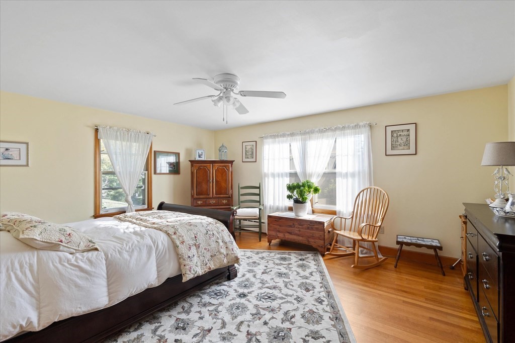 16 Main Street Sturbridge, MA 01566 - Photo 15 of 39 a bedroom with a bed a chair and a couch
