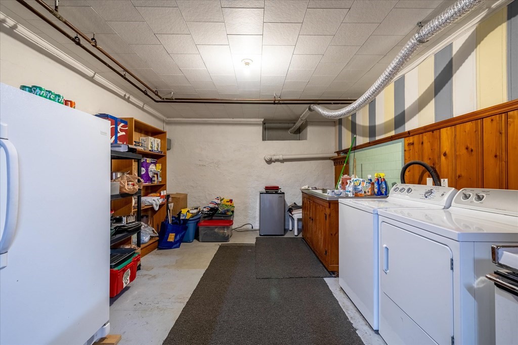 16 Main Street Sturbridge, MA 01566 - Photo 22 of 39 a storage room with washer and dryer
