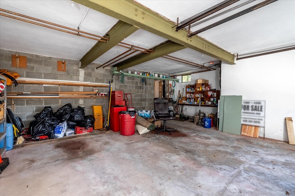 16 Main Street Sturbridge, MA 01566 - Photo 25 of 39 a view of a storage room with a lot of stuff