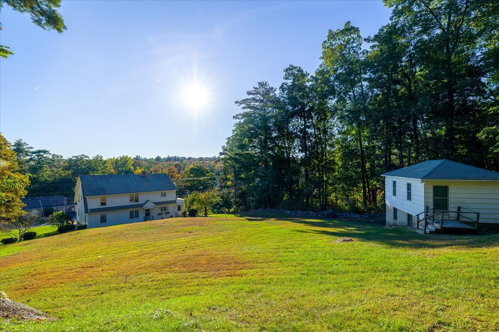 16 Main Street Sturbridge, MA 01566 - Photo 28 of 39 a swimming pool is sitting in the middle of a swimming pool
