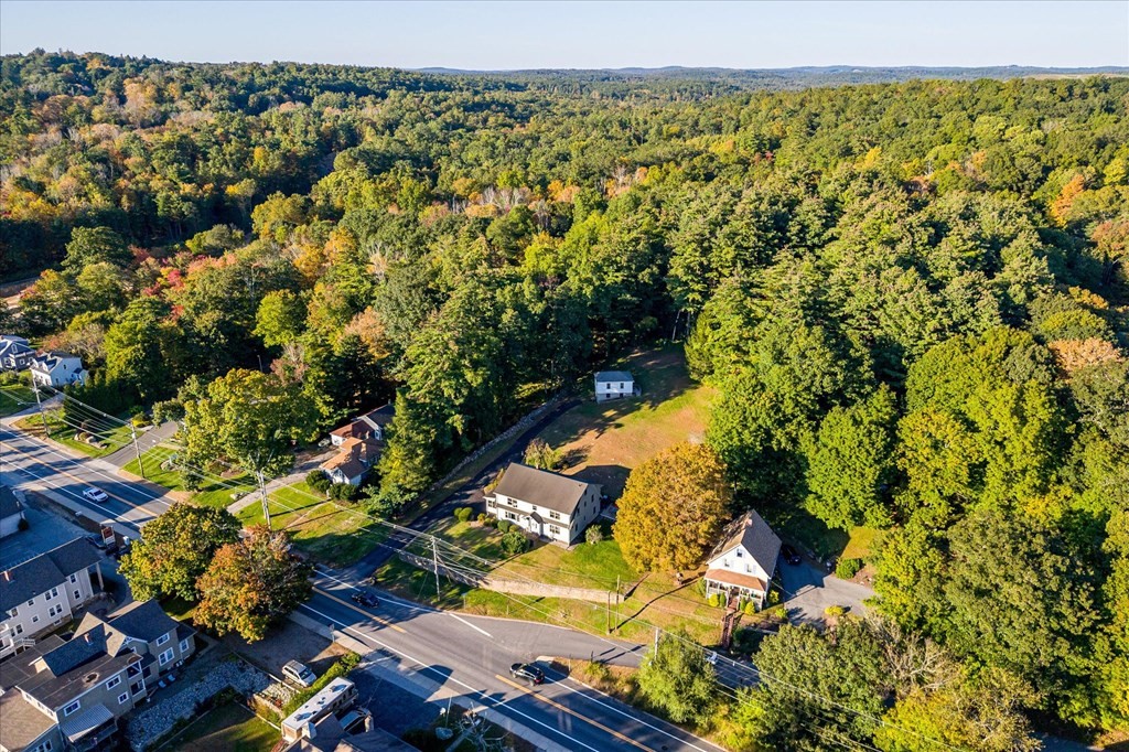16 Main Street Sturbridge, MA 01566 - Photo 3 of 39 an aerial view of a residential houses with yard