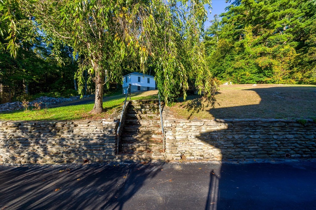 16 Main Street Sturbridge, MA 01566 - Photo 31 of 39 a view of a yard with plants