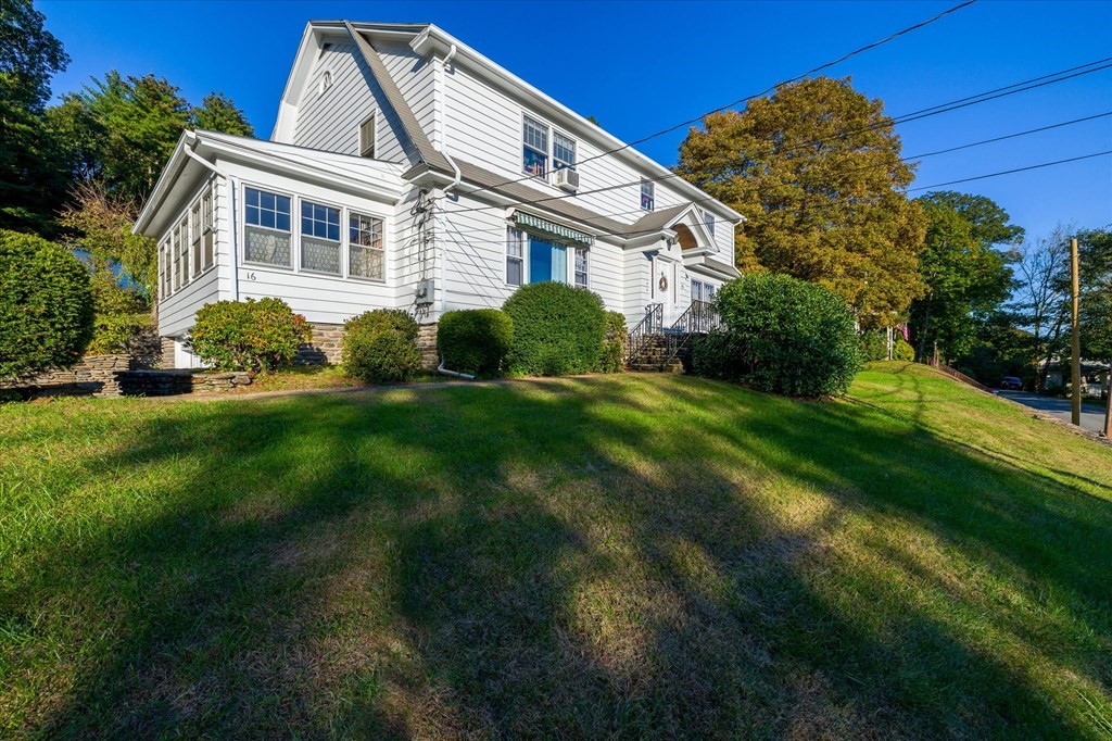 16 Main Street Sturbridge, MA 01566 - Photo 32 of 39 a front view of a house with a yard
