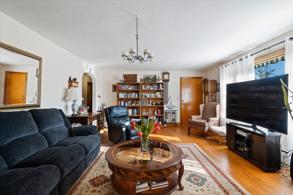 16 Main Street Sturbridge, MA 01566 - Photo 8 of 39 a living room with furniture and a flat screen tv