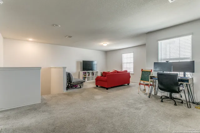 a bedroom with furniture and a bed