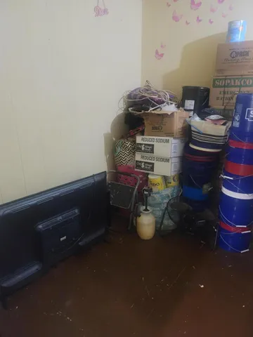 a room with furniture and a wooden floor