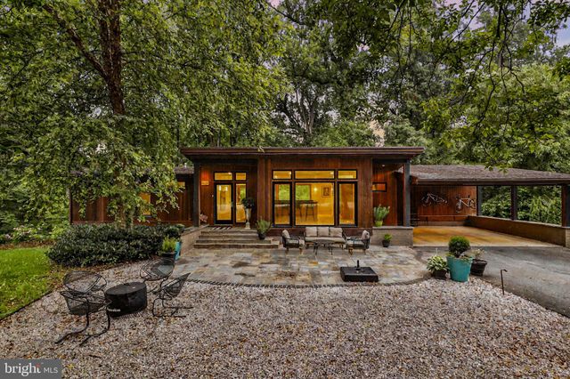 a front view of a house with patio