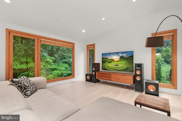 a bathroom with a bathtub and a sink