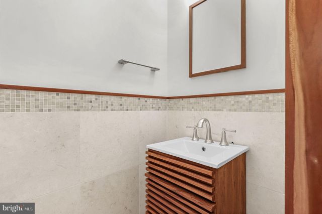 a view of a room with a large window