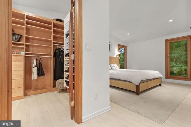 a view of a backyard with sitting area