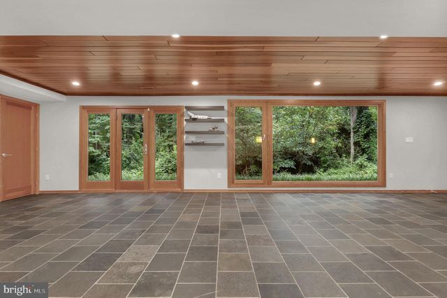 a view of a patio with couches and chairs