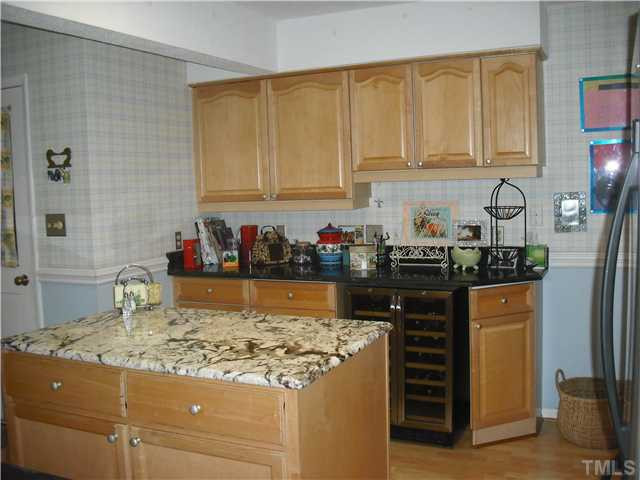 3316 Manor Ridge Drive Raleigh, NC 27603 - Photo 4 of 15 the has been beautifully updated, including the cabinets, granite countertops and appliances. Kitchen