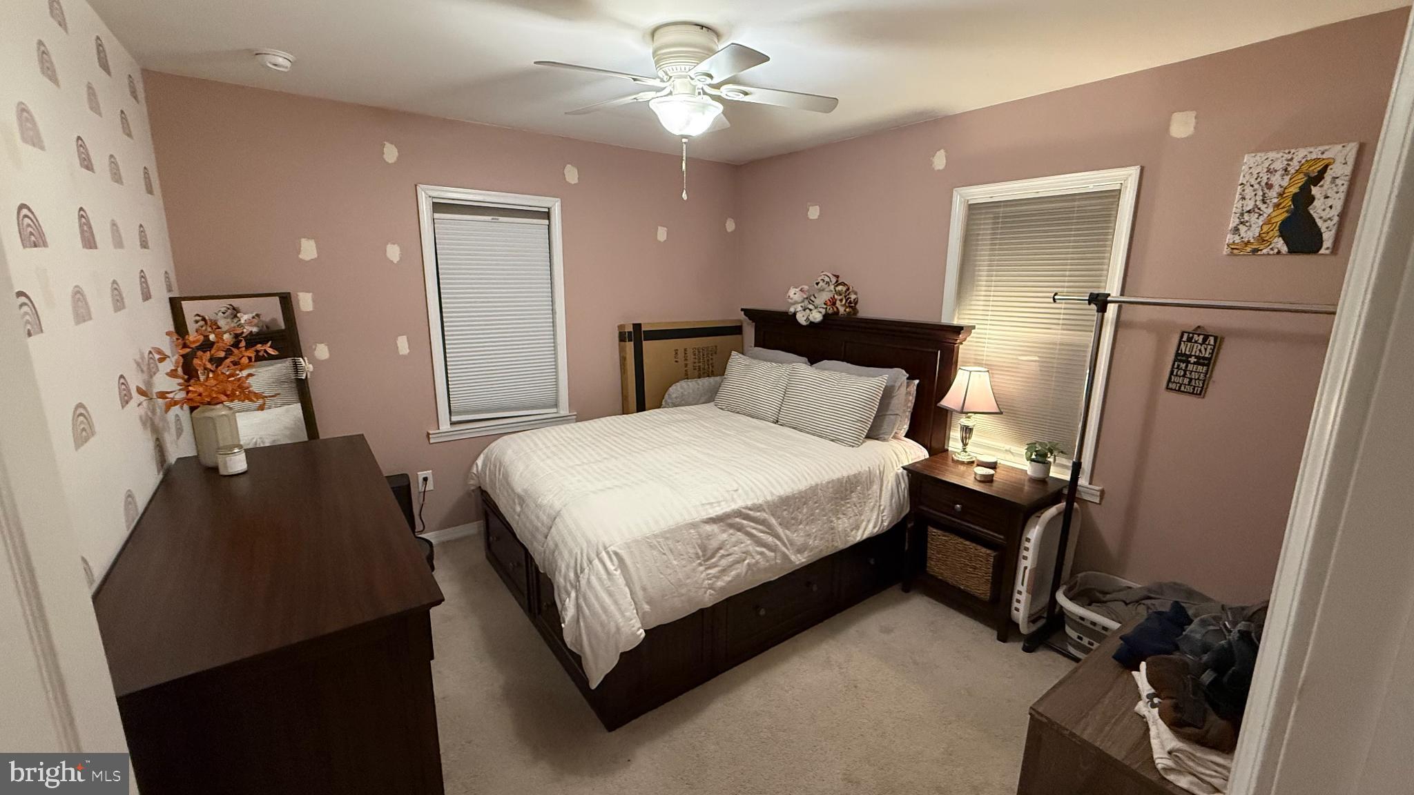 32 Alden Avenue Delran, NJ 08075 - Photo 13 of 13 a bedroom with a bed and a chandelier