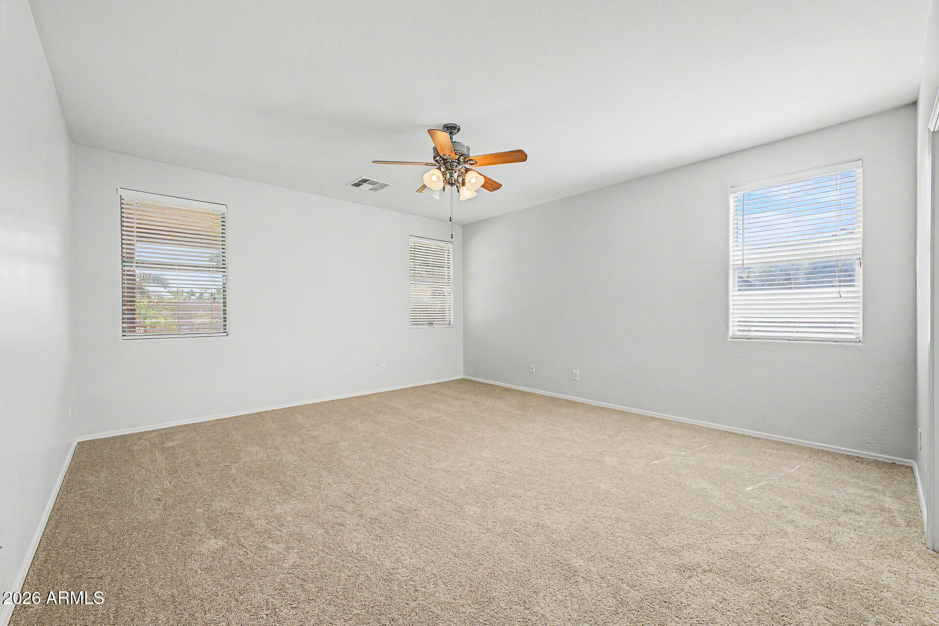 45449 West Tucker Road Maricopa, AZ 85139 - Photo 22 of 46 a view of an empty room with a window
