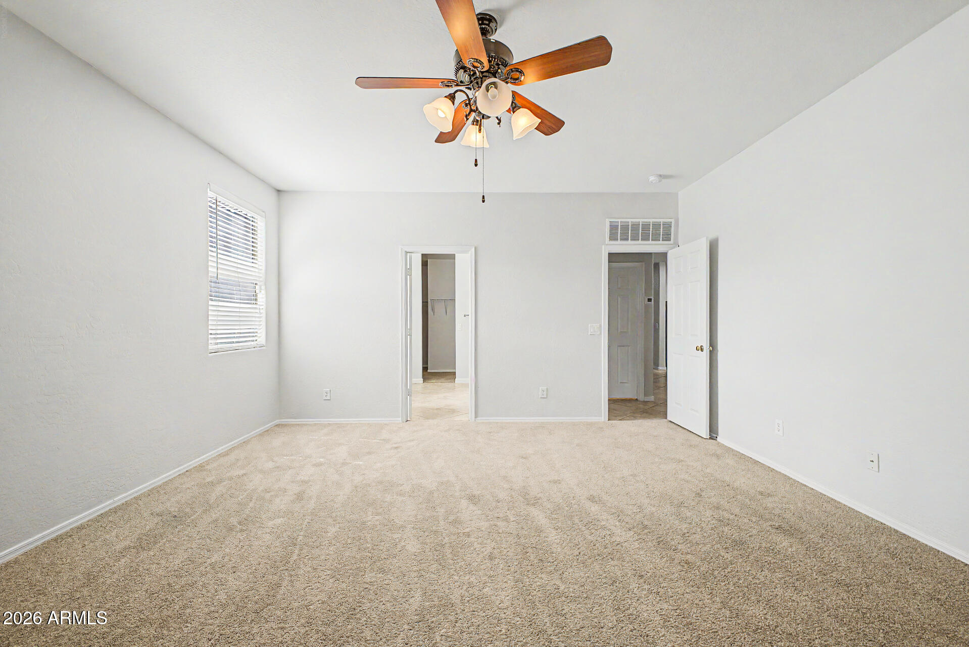 45449 West Tucker Road Maricopa, AZ 85139 - Photo 25 of 46 a view of an empty room with a window