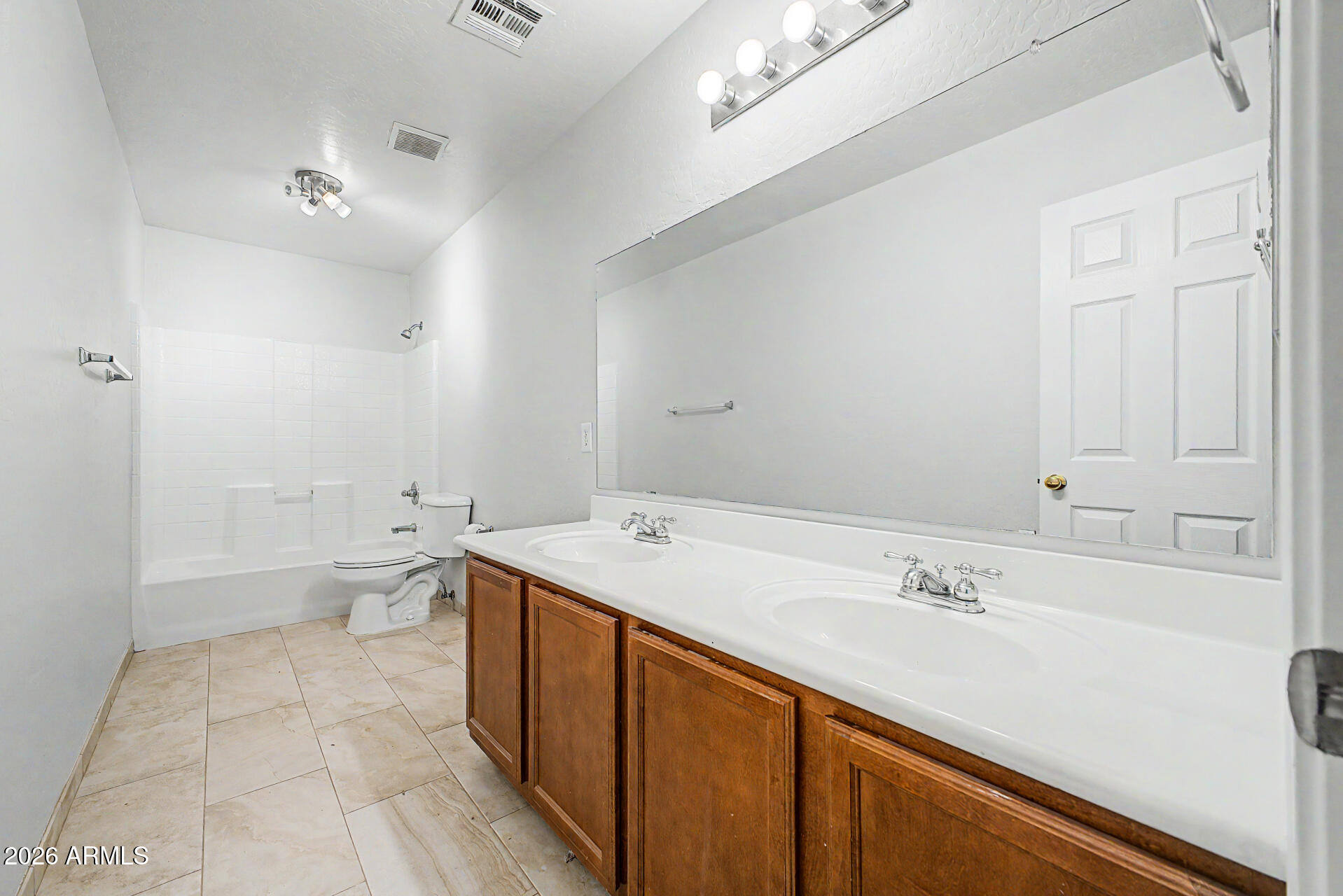 45449 West Tucker Road Maricopa, AZ 85139 - Photo 28 of 46 a spacious bathroom with a sink a toilet and a tub