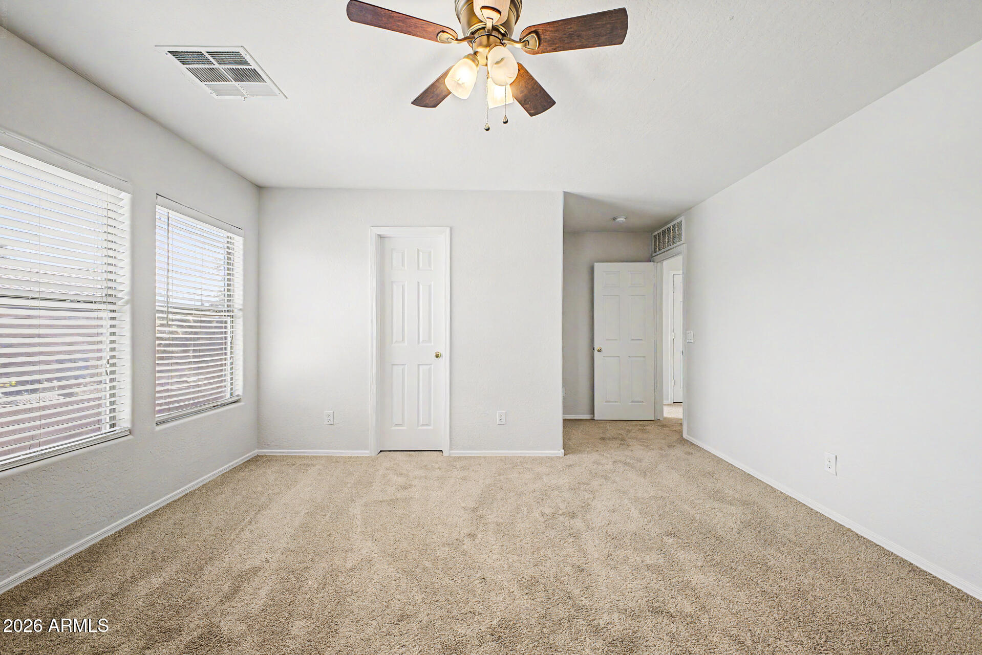 45449 West Tucker Road Maricopa, AZ 85139 - Photo 30 of 46 a view of an empty room and window