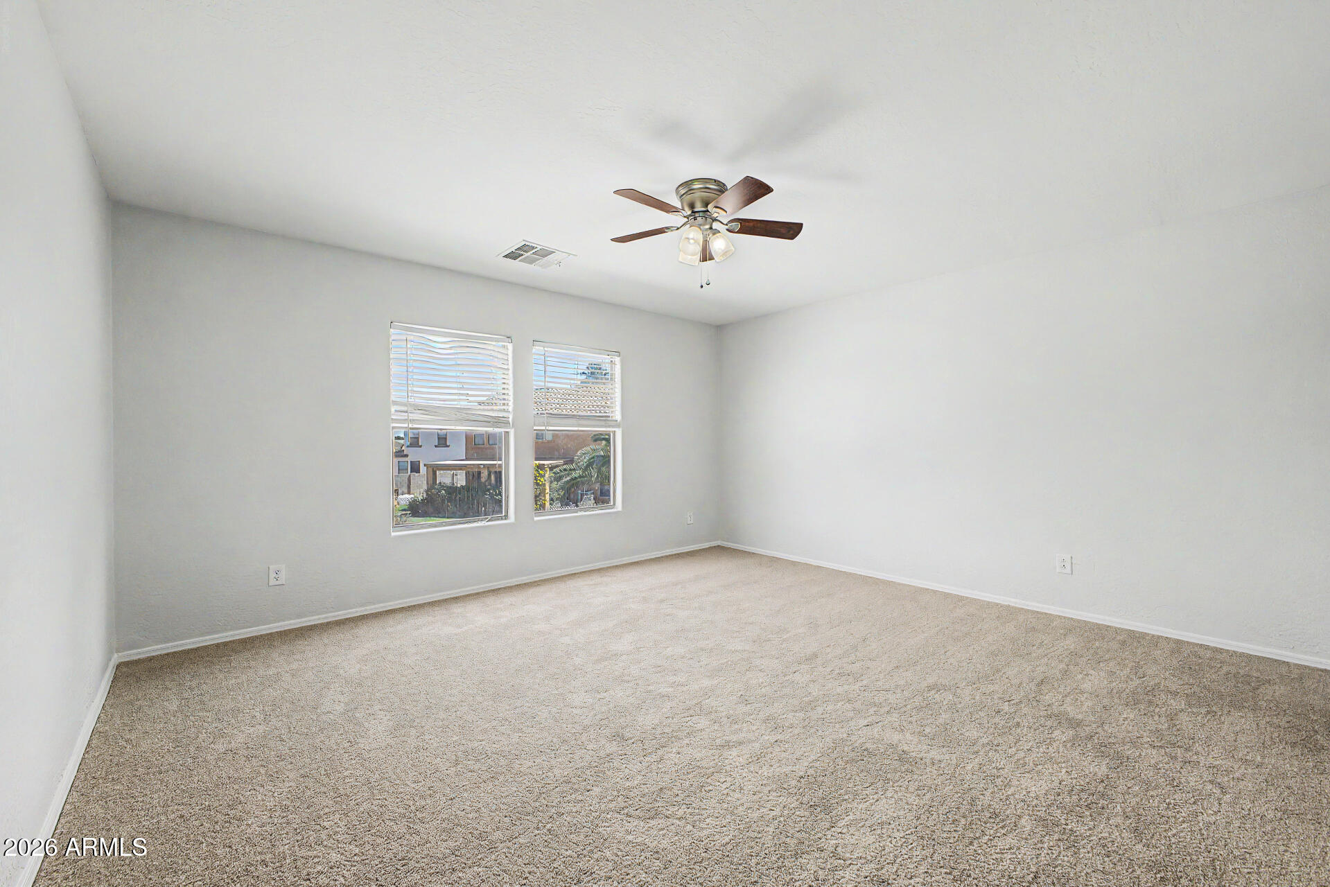 45449 West Tucker Road Maricopa, AZ 85139 - Photo 31 of 46 an empty room with windows