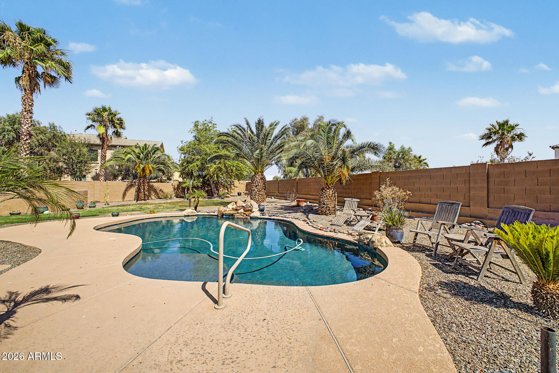 45449 West Tucker Road Maricopa, AZ 85139 - Photo 34 of 46 a view of swimming pool with outdoor seating and plants