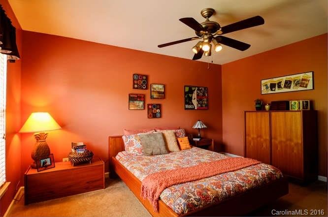 207 Snead Road, Unit 207 Fort Mill, SC 29715 - Photo 13 of 19 a bedroom with a bed and ceiling fan