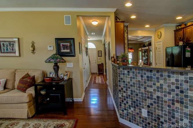 207 Snead Road, Unit 207 Fort Mill, SC 29715 - Photo 6 of 19 a living room with furniture and a rug