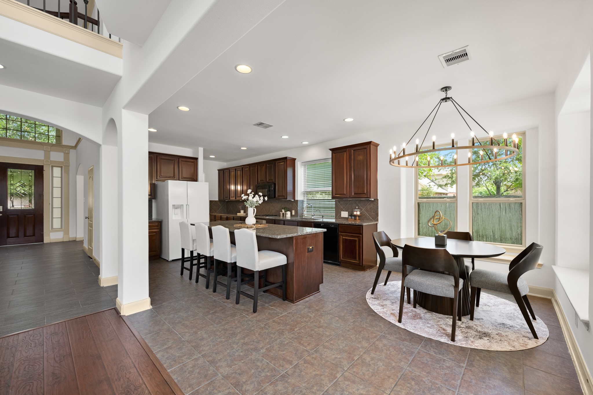 4603 Red Hawk Court Sugar Land, TX 77479 - Photo 15 of 50 a view of a dining room with furniture window and wooden floor
