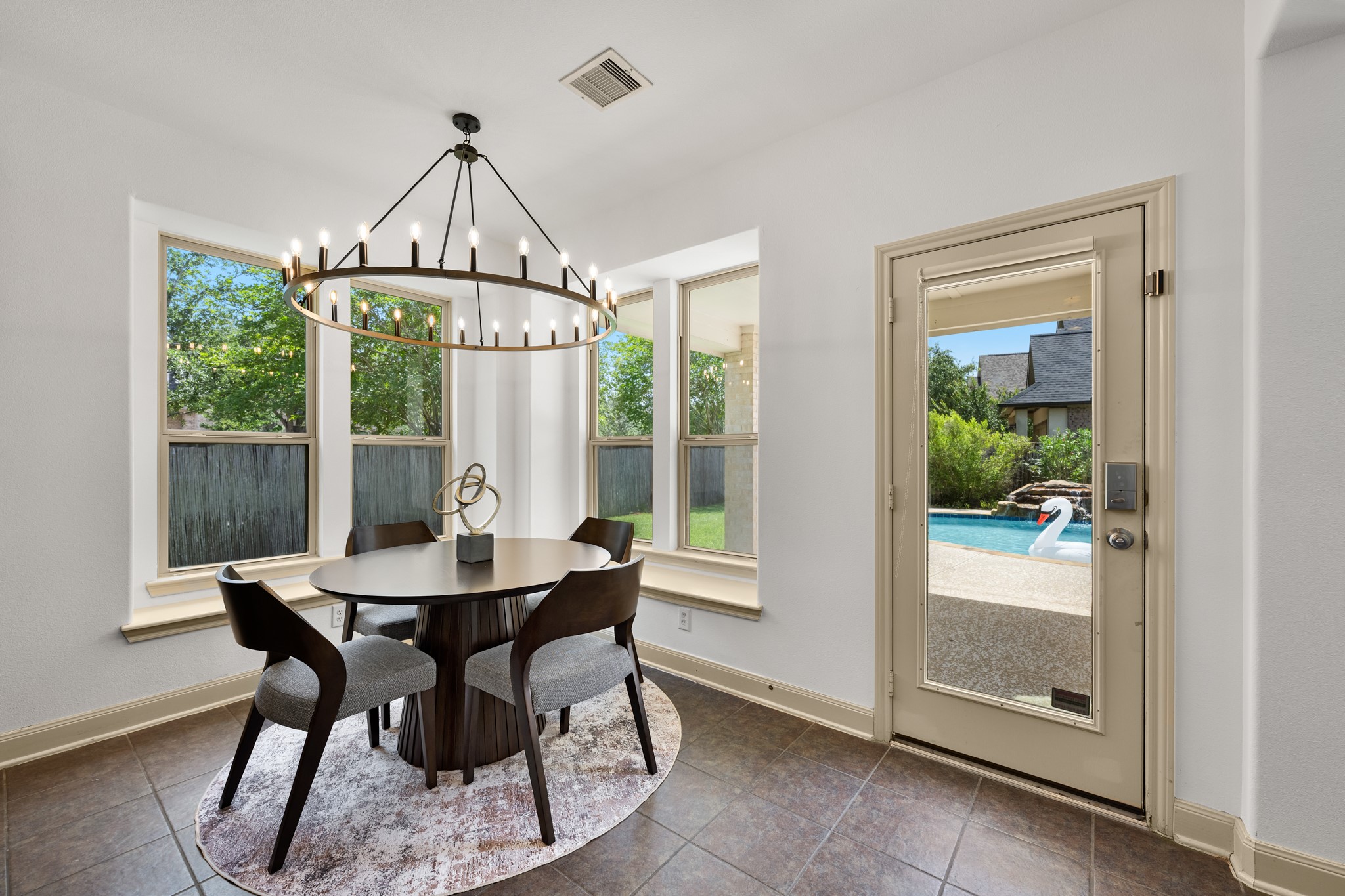 4603 Red Hawk Court Sugar Land, TX 77479 - Photo 16 of 50 a dining room with furniture window and outside view