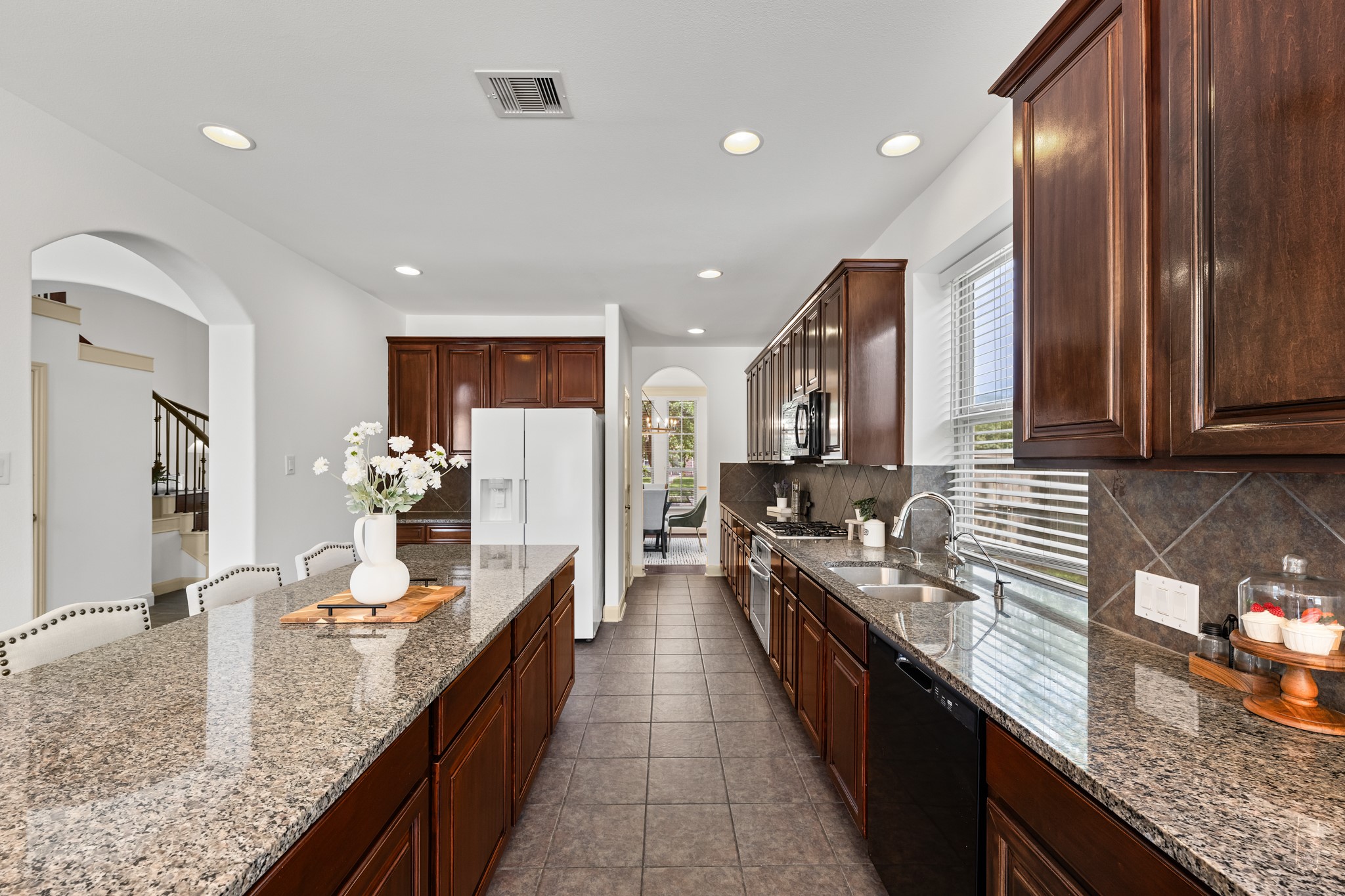 4603 Red Hawk Court Sugar Land, TX 77479 - Photo 18 of 50 a large kitchen with granite countertop lots of counter top space