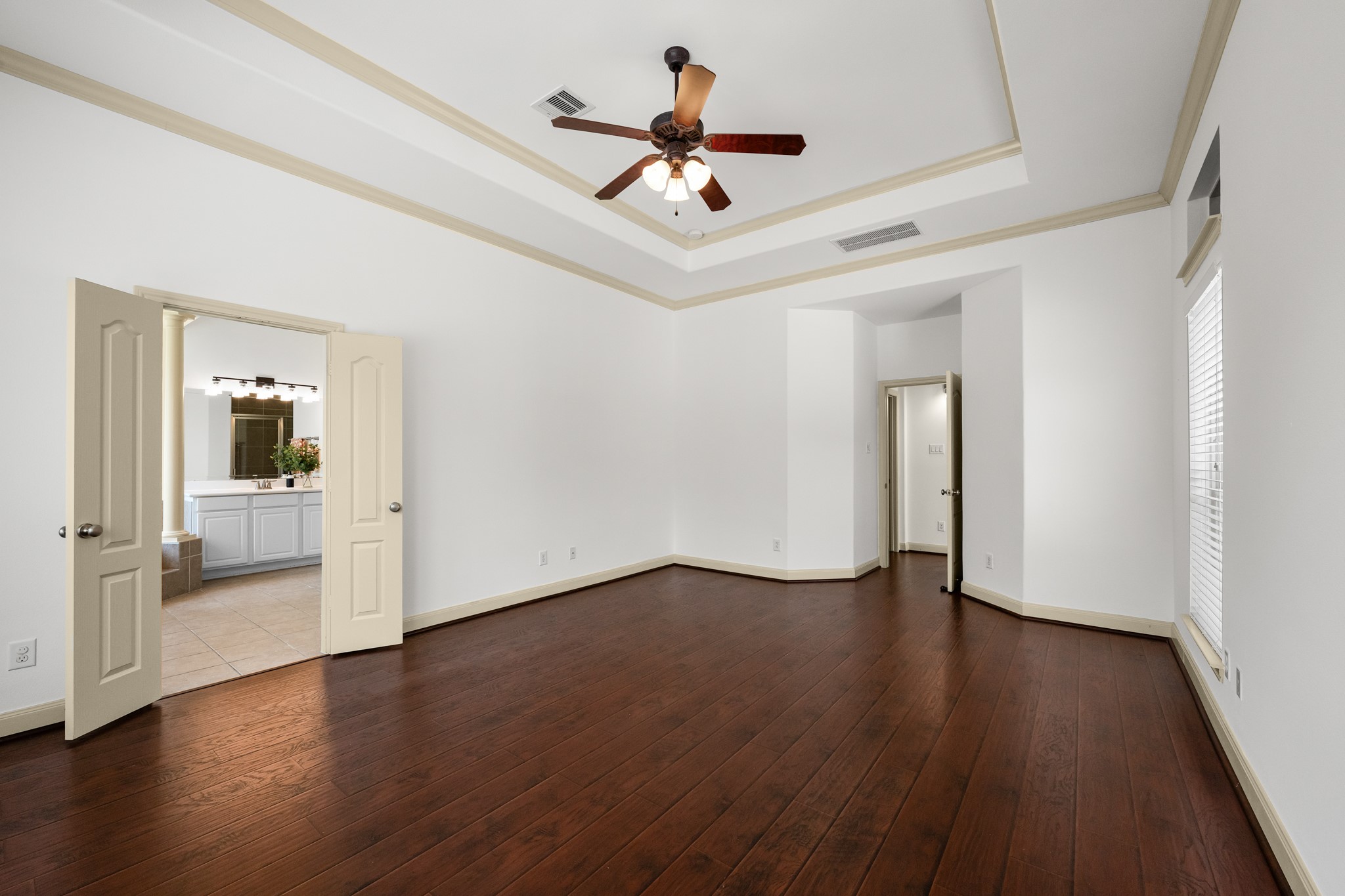 4603 Red Hawk Court Sugar Land, TX 77479 - Photo 22 of 50 a view of room with wooden floor and ceiling fan